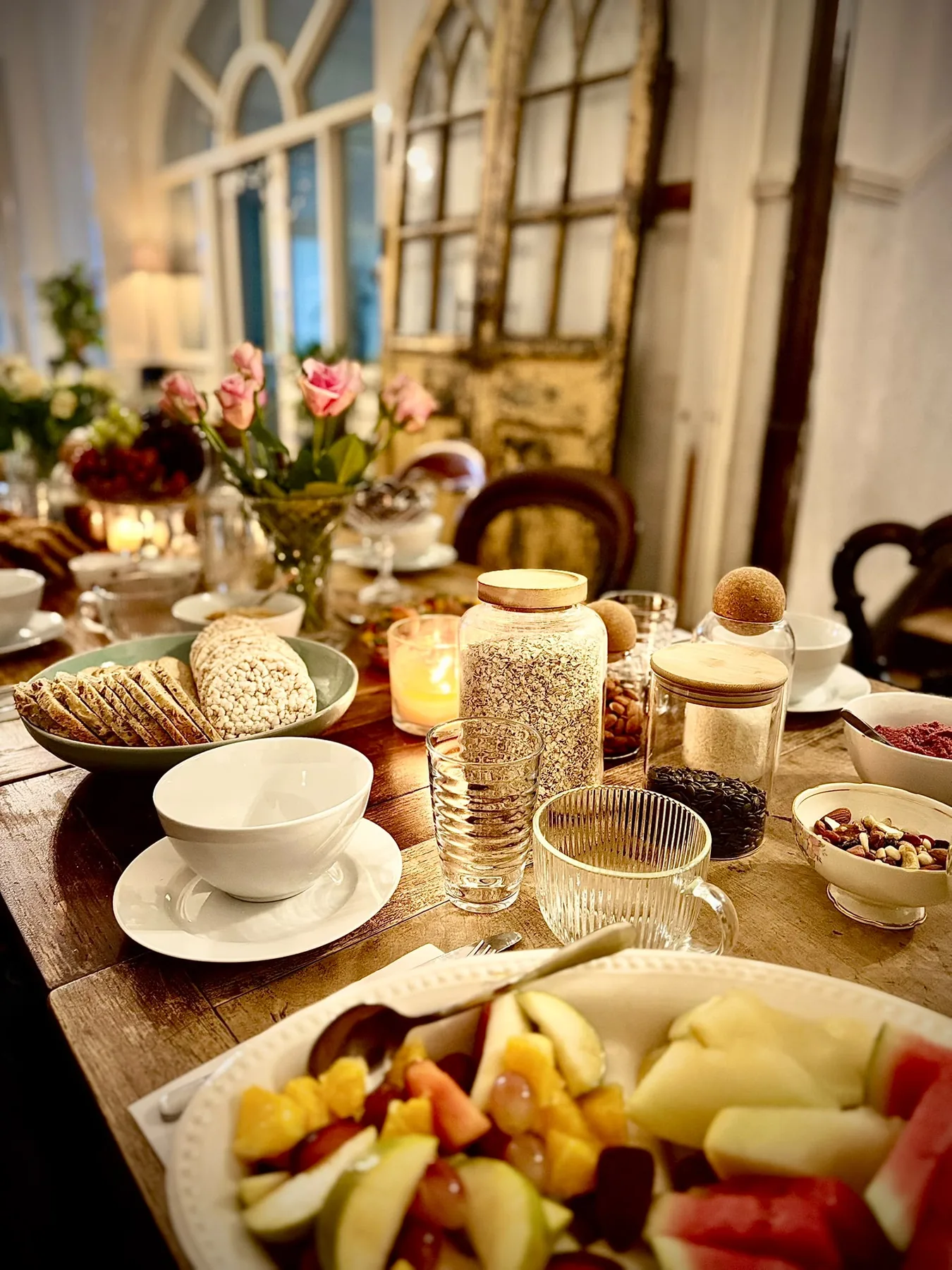 Long breakfast table prepared for retreat guests